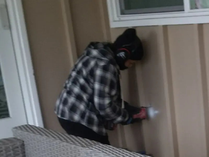 Professional electrician installing an exterior outlet in Saranap