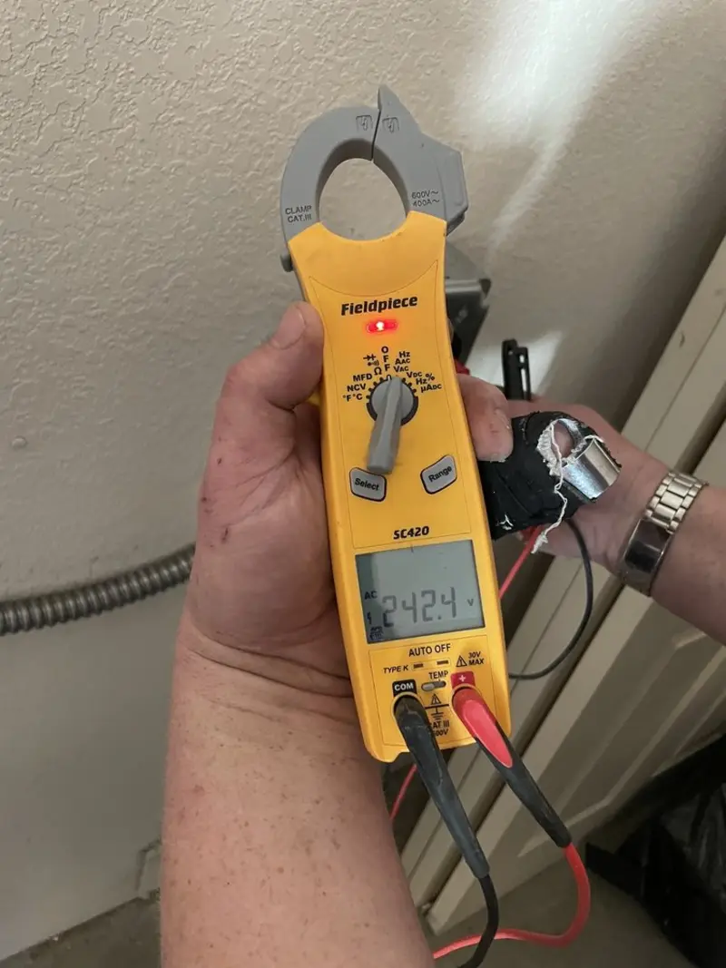 Voltage testing with clamp meter during Generator Installation in Saranap